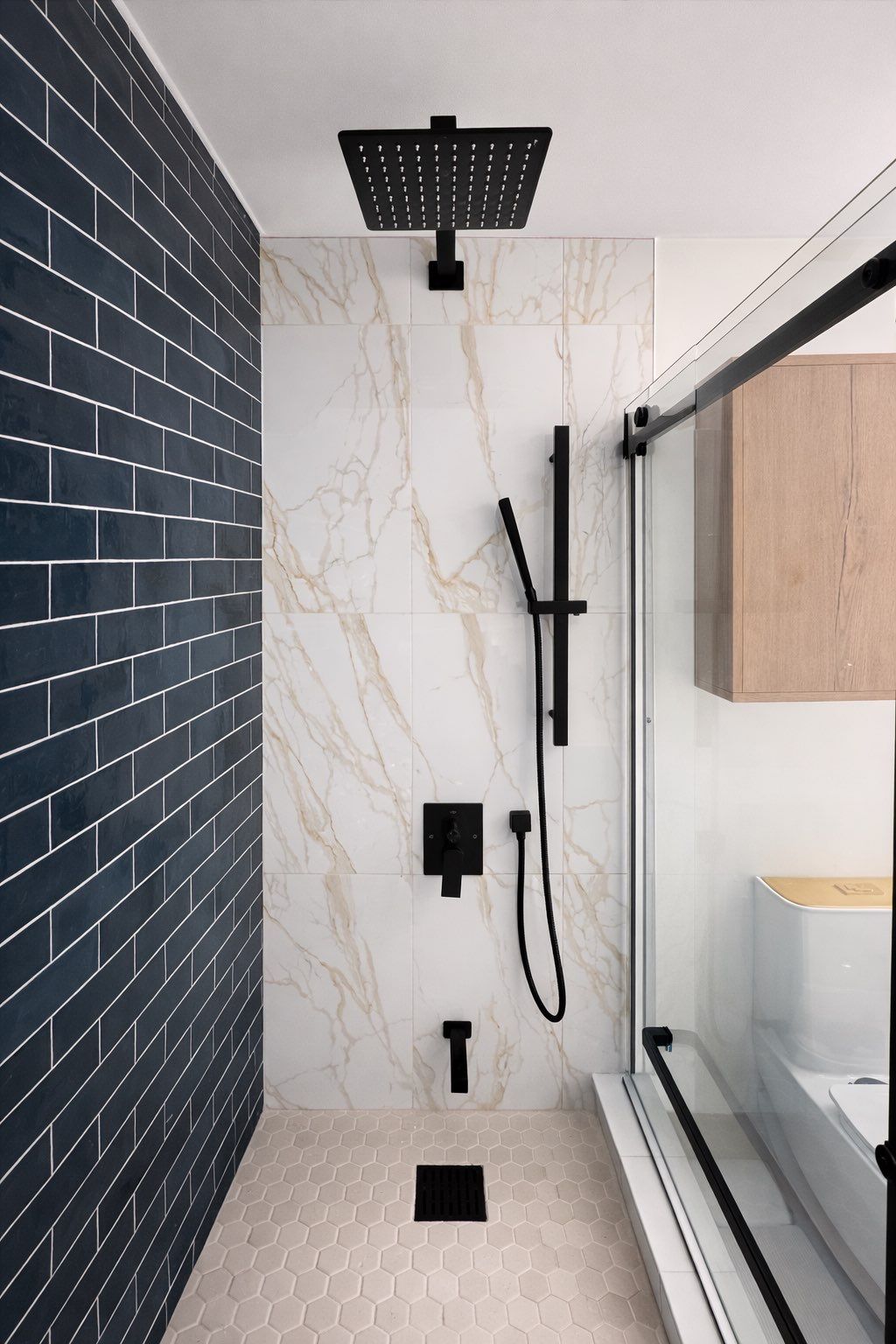 Black tile and oak bathroom view 7