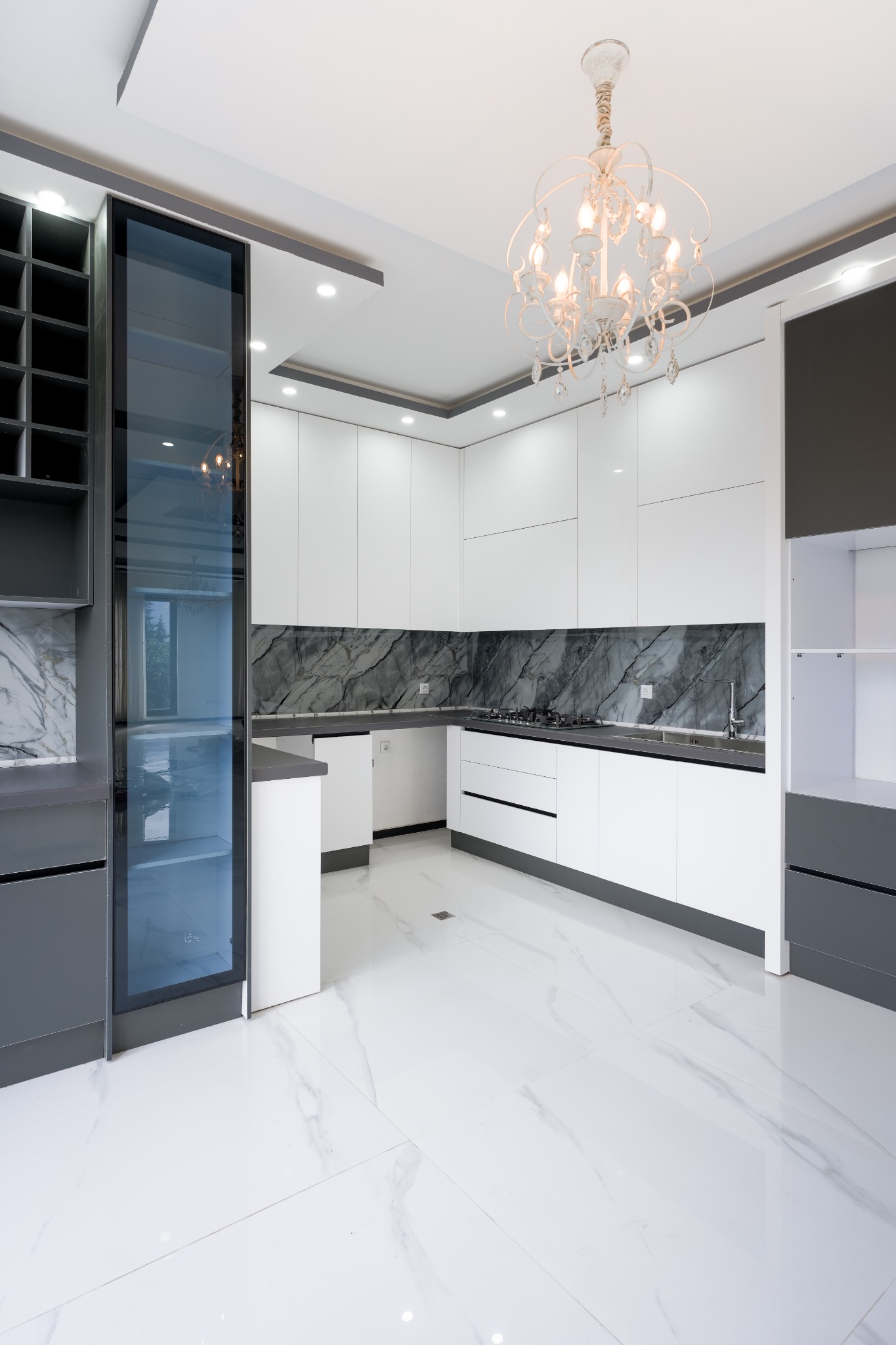 White cabinetry and charcoal kitchen details