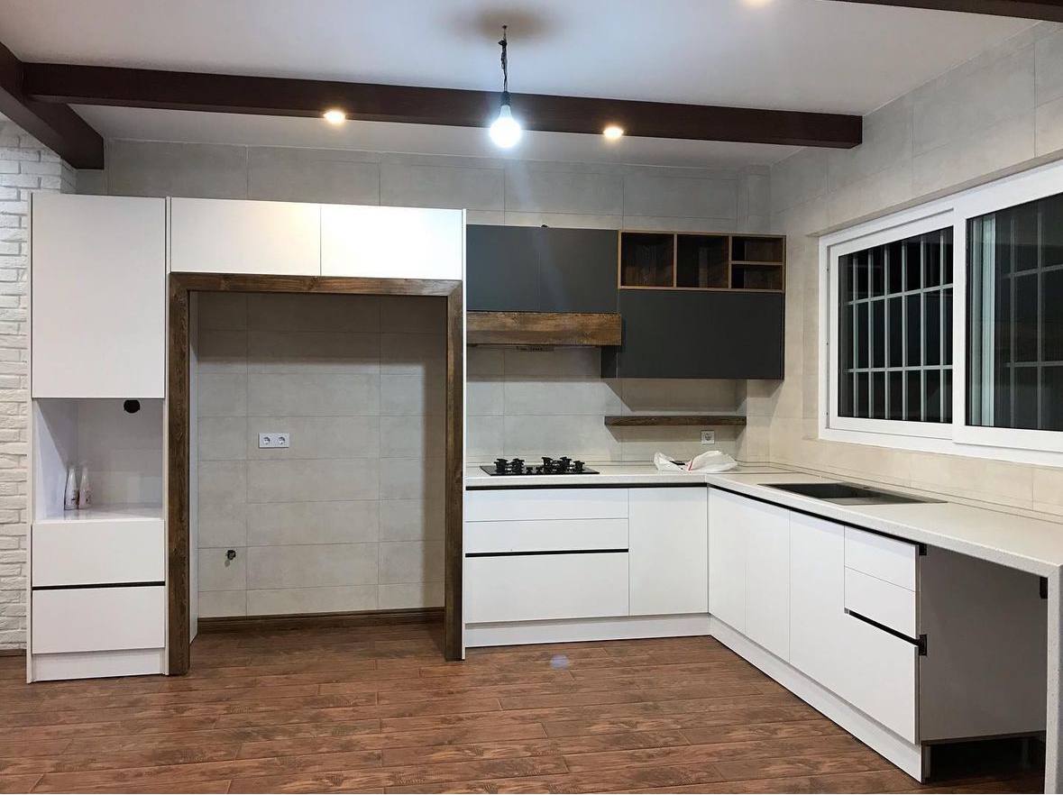 White and dark wood kitchen