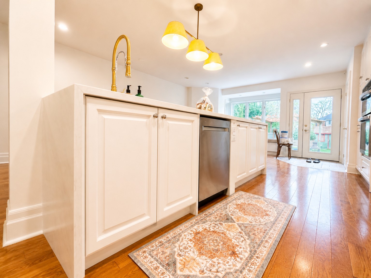 Kitchen island cabinetry and dishwasher